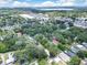 Wide aerial shot showcasing the neighborhood and the property's location at 312 Palencia Pl, Lakeland, FL 33803
