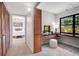 Bedroom with sitting vanity, closet, stool and natural light at 312 Palencia Pl, Lakeland, FL 33803