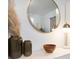 Neutral, modern entryway decor featuring minimalist lighting, vases and mirror at 312 Palencia Pl, Lakeland, FL 33803