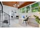 Bright home office with a large window offering natural light, perfect for a productive work-from-home environment at 312 Palencia Pl, Lakeland, FL 33803