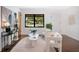 Bright living area with modern decor, hardwood floors, and comfortable seating, perfect for relaxation and entertaining guests at 312 Palencia Pl, Lakeland, FL 33803