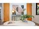 Cozy living area features stylish decor, including a sleek console table, modern artwork, and comfortable seating at 312 Palencia Pl, Lakeland, FL 33803