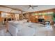 A spacious living room featuring an open concept design with comfortable seating at 312 Palencia Pl, Lakeland, FL 33803