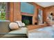 Inviting living room with brick fireplace and comfortable seating at 312 Palencia Pl, Lakeland, FL 33803