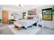 Spacious main bedroom features a comfortable bed and stylish modern decor at 312 Palencia Pl, Lakeland, FL 33803