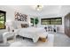 Well lit main bedroom features modern decor and comfortable furniture at 312 Palencia Pl, Lakeland, FL 33803