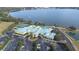 An aerial view of the lakefront community, showing pool and clubhouse at 3136 Langdon Ln, Winter Haven, FL 33884