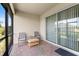 Covered screened lanai with brick flooring, providing a relaxing outdoor space at 3136 Langdon Ln, Winter Haven, FL 33884