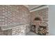 Close-up of brick outdoor kitchen, showcasing a pizza oven and ample counter space at 323 E Belvedere St, Lakeland, FL 33803