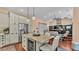 Beautiful kitchen with granite counters, stainless steel appliances, and wine cooler at 3243 Red Tail Hawk Dr, Polk City, FL 33868