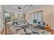 Open-concept living room, kitchen, and dining area provide an easy flow through the home at 3243 Red Tail Hawk Dr, Polk City, FL 33868