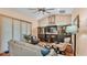 Comfortable living room with hardwood floors, ceiling fan, and recessed lighting at 3243 Red Tail Hawk Dr, Polk City, FL 33868