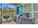 Patio features a grilling station, and patio furniture, great for outdoor cooking and relaxation at 3243 Red Tail Hawk Dr, Polk City, FL 33868