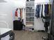Large walk-in closet with ample storage and organization systems, offering abundant space at 355 E Columbia St, Lake Alfred, FL 33850