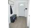 Hallway showing coat rack and shoe cubby at 355 E Columbia St, Lake Alfred, FL 33850