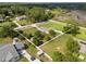 Home with a large yard surrounded by trees in a rural location near a pond at 3810 Harrelson Rd, Lakeland, FL 33810