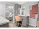Stylish bathroom with vanity, lit mirror, and a view into a relaxing seating area at 3810 Harrelson Rd, Lakeland, FL 33810