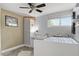 Cozy bedroom includes a single bed, workspace, and natural light from the window at 3810 Harrelson Rd, Lakeland, FL 33810