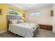 Bright bedroom with modern decor, wood-look floors, and comfortable furnishings at 3810 Harrelson Rd, Lakeland, FL 33810