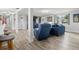 Inviting living room featuring hardwood floors, comfortable seating, and plenty of living space at 3810 Harrelson Rd, Lakeland, FL 33810