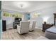 Relaxing main bedroom featuring seating, natural light, and neutral tones for a peaceful retreat at 3810 Harrelson Rd, Lakeland, FL 33810