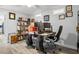 Home office with multiple workspaces, modern decor, and ample storage at 3810 Harrelson Rd, Lakeland, FL 33810