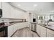Well-equipped kitchen featuring ample countertop space and stainless steel appliances at 4303 Moon Shadow Loop, Mulberry, FL 33860