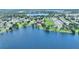 Enjoy the lakefront lifestyle from this community, as showcased in this aerial view of homes with lake access at 440 Lake Daisy, Winter Haven, FL 33884