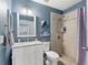 Bathroom with granite vanity and walk in shower at 440 Lake Daisy, Winter Haven, FL 33884