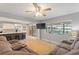 Spacious living room adjacent to open concept kitchen at 440 Lake Daisy, Winter Haven, FL 33884