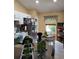 Bright kitchen with stainless steel appliances and cozy breakfast nook at 455 Eagle Dr, Kissimmee, FL 34759