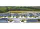Aerial view of neighborhood homes with pond view at 511 Preserve Pointe Blvd, Davenport, FL 33837