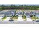 Aerial view of house in a neighborhood backing to a pond at 511 Preserve Pointe Blvd, Davenport, FL 33837