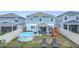 View of backyard play structure and above ground pool at 511 Preserve Pointe Blvd, Davenport, FL 33837