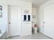 Bright bathroom with a tub, toilet, and nautical themed décor for a fresh and inviting atmosphere at 511 Preserve Pointe Blvd, Davenport, FL 33837