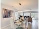 Elegant dining room with stylish lighting and modern decor, perfect for entertaining at 511 Preserve Pointe Blvd, Davenport, FL 33837