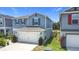 Well-maintained two-story home with two-car garage, and low maintenance landscaping at 511 Preserve Pointe Blvd, Davenport, FL 33837