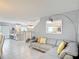 Bright living room features a comfortable couch and modern decor at 511 Preserve Pointe Blvd, Davenport, FL 33837