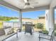 Covered patio area with grill, bench, and above-ground pool, ideal for outdoor living at 511 Preserve Pointe Blvd, Davenport, FL 33837