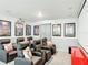 Home theater with comfortable seating, projector and screen for immersive entertainment at 511 Preserve Pointe Blvd, Davenport, FL 33837