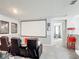 Entertainment room with plush seating and a screen; perfect for movie nights and gaming at 511 Preserve Pointe Blvd, Davenport, FL 33837