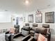 Home theater featuring plush seating, a projector, and a screen for ultimate entertainment at 511 Preserve Pointe Blvd, Davenport, FL 33837
