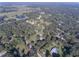 Aerial view of single Gathering homes surrounded by lush trees at 5121 Shady Oak S Dr, Lakeland, FL 33810