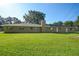 A spacious, green backyard complements the single-story house at 5121 Shady Oak S Dr, Lakeland, FL 33810