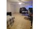 Bedroom featuring a ceiling fan, a closet, and room for an office space at 5121 Shady Oak S Dr, Lakeland, FL 33810