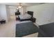 Large main bedroom with ceiling fans, an ensuite bathroom, and lots of closet space at 5121 Shady Oak S Dr, Lakeland, FL 33810
