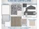 Display of various material selections including cabinets, countertops, wall tile, flooring, and paint colors at 5393 Se 129Th Ln, Belleview, FL 34420