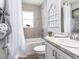 Well-lit bathroom with a tub, shower, granite vanity and elegant fixtures, providing a spa-like experience at 5424 Se 127Th Ln, Belleview, FL 34420