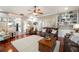 Spacious living room with hardwood floors and custom built-in shelving at 5425 Charlin Ave, Lakeland, FL 33810