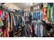 Well-organized walk-in closet with shelving and hanging space, offering ample storage for clothing and accessories at 5425 Charlin Ave, Lakeland, FL 33810